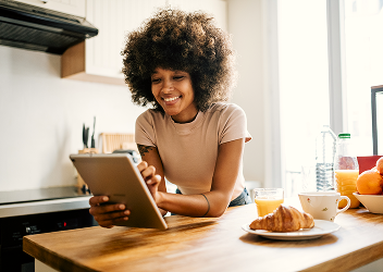 A client looking at their tablet.