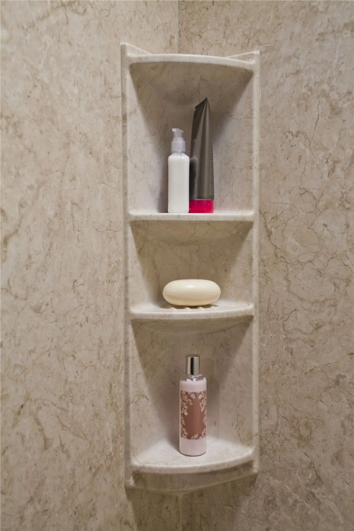 Built-in shower shelving for organized, low-maintenance bathrooms