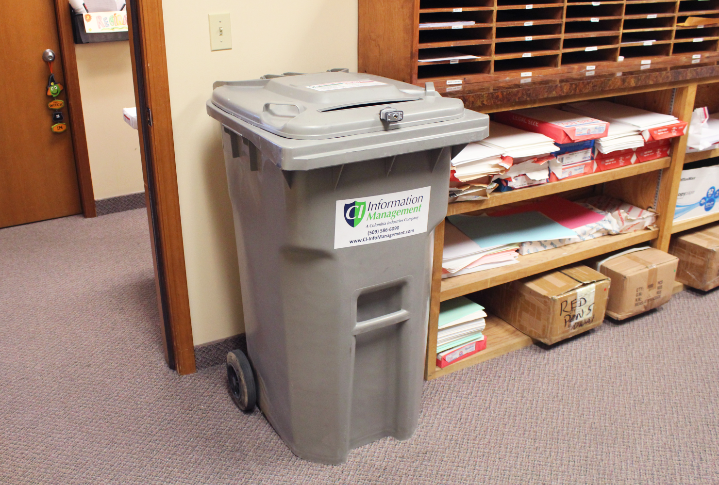 A CI Information Management 64-gallon bin