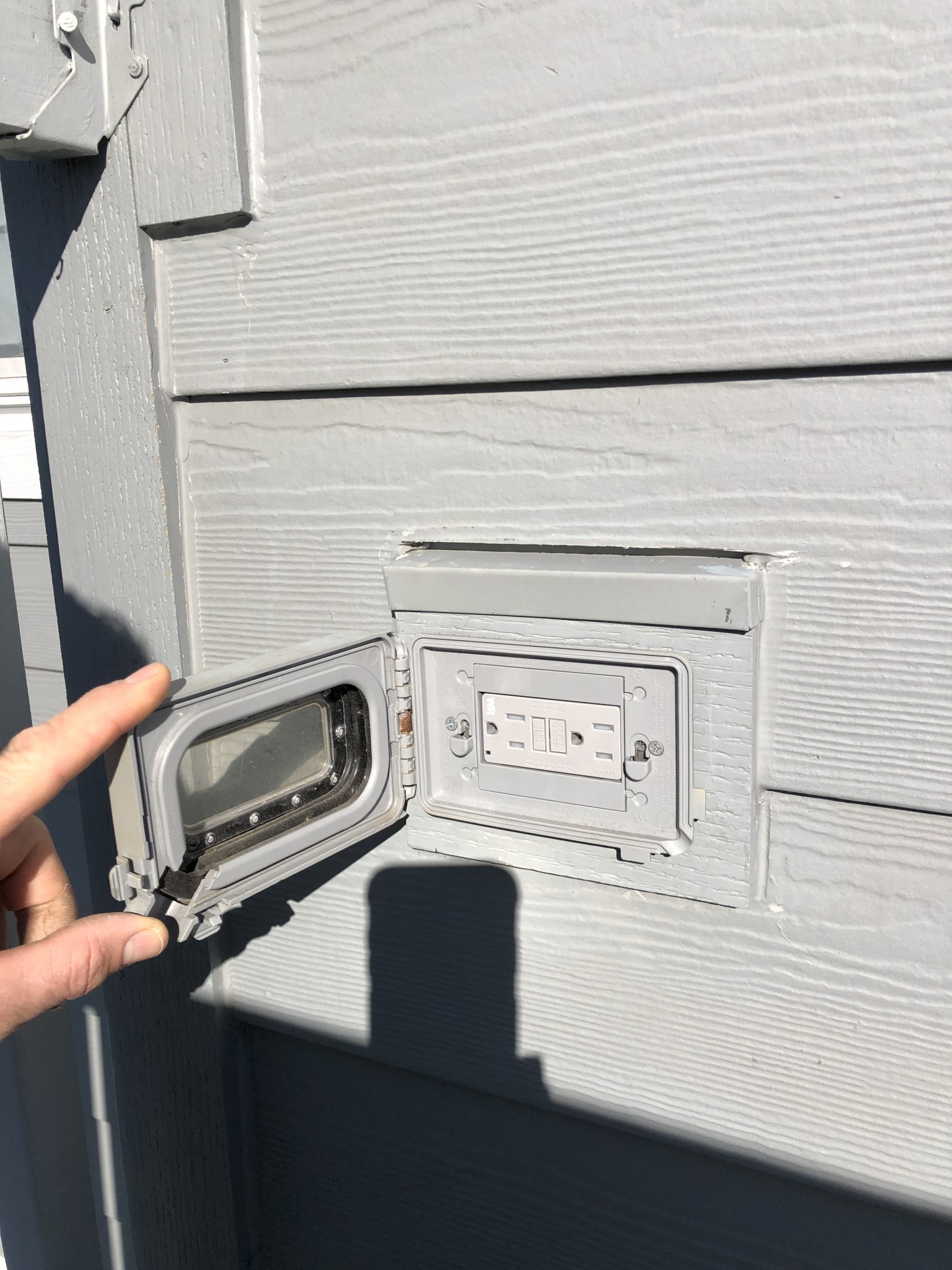 New exterior rated WR (weather-resistant) Leviton electrical  GFCI device. Now let's power up those holiday lights.