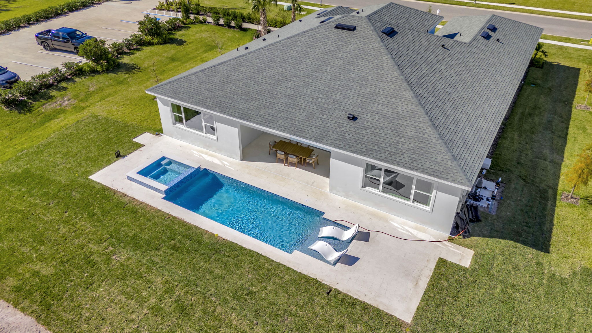 The Backyard Pool of a DRB Homes Sabal Model at Serengeti in Spring Hill, FL.