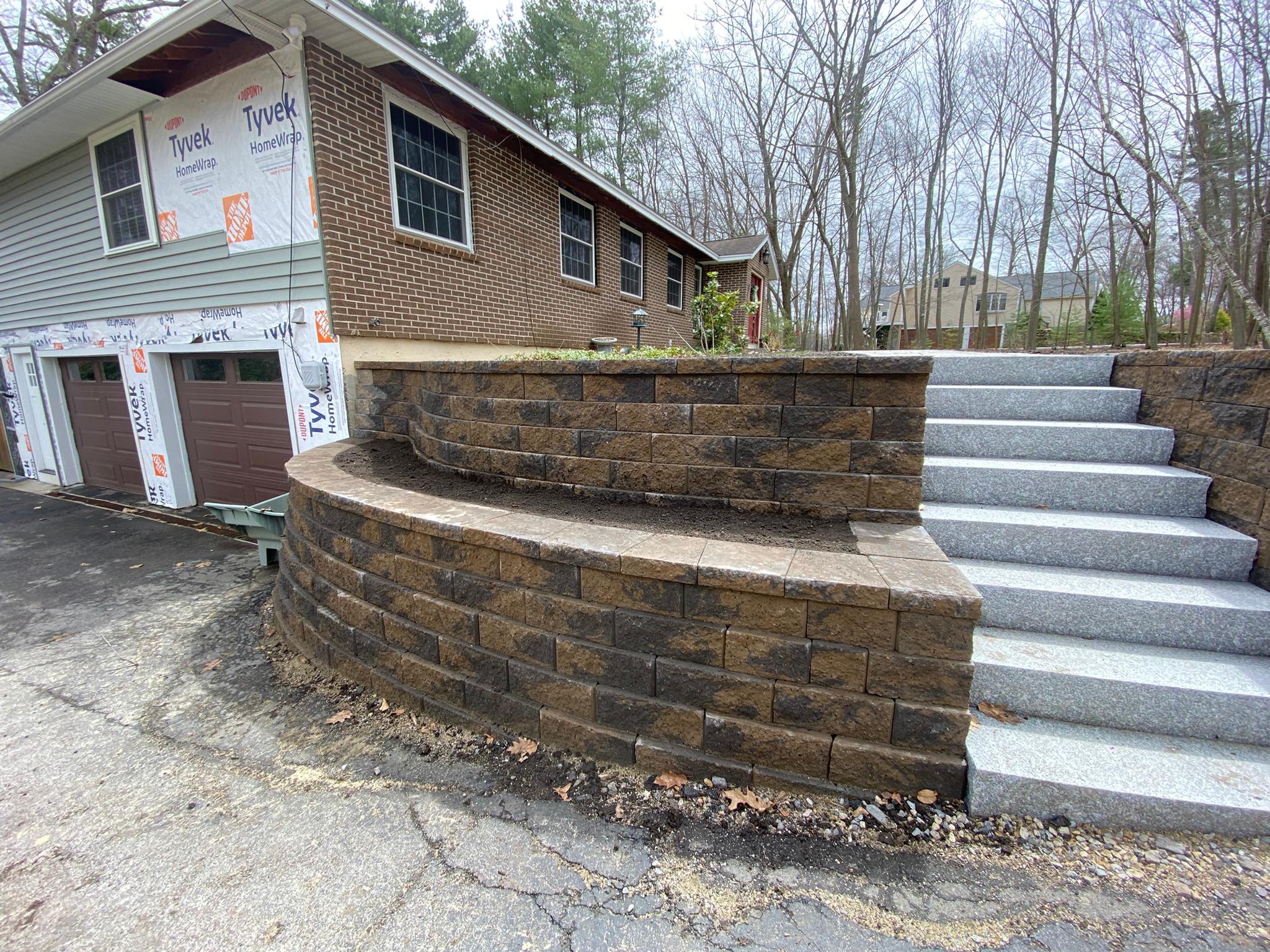 Retaining wall with granite steps