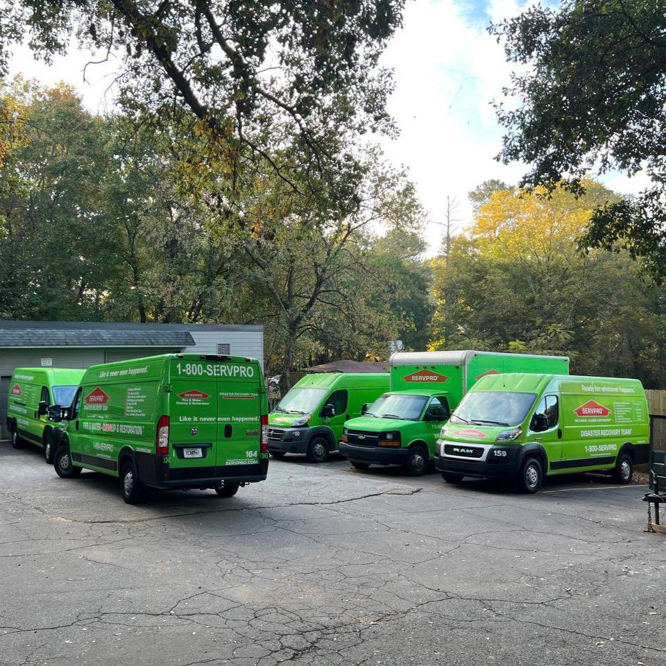 SERVPRO of Jackson and Madison Counties fleet outside in their lot.
