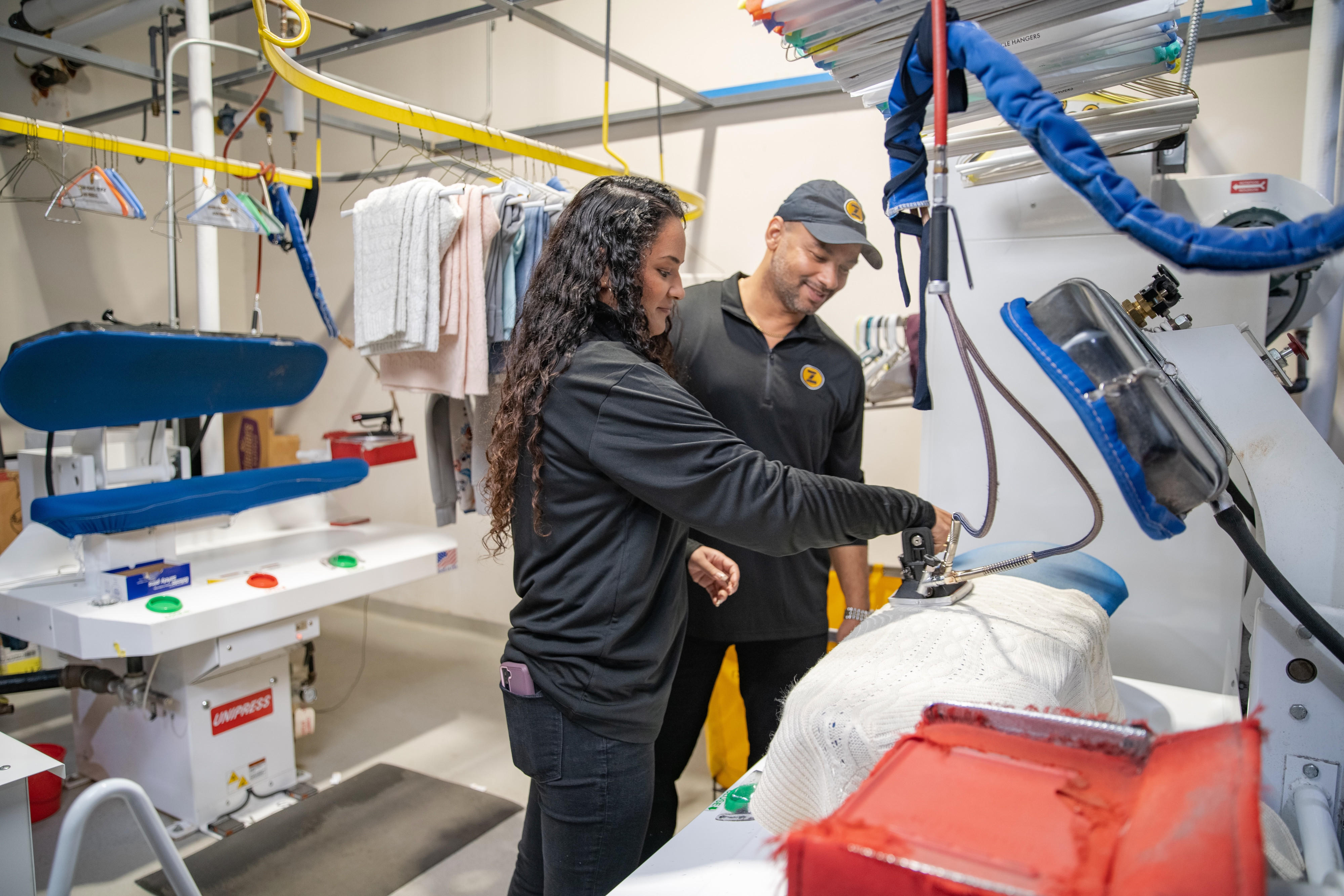 ZIPS Cleaners owners and managers take a hand-on approach to making sure our store team members are thoroughly trained on all our specialized pressing equipment.