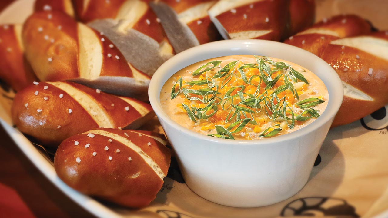Warm authentic Bavarian pretzel sticks, Buttface Amber Ale beer cheese fondue.
