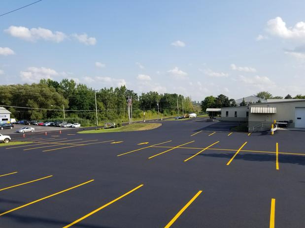 Images Pinnacle Sealing and Plowing Inc