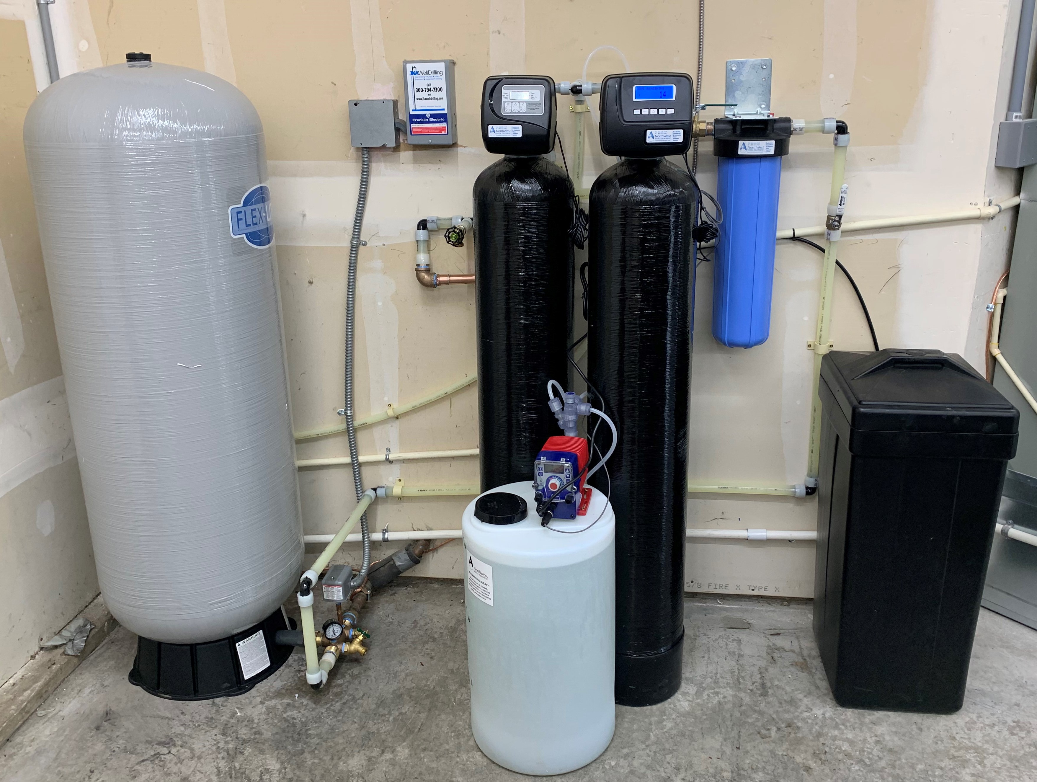 This whole-home water filtration system for a family in Maple Valley, WA, removes iron, manganese, sediment, and sulfur.