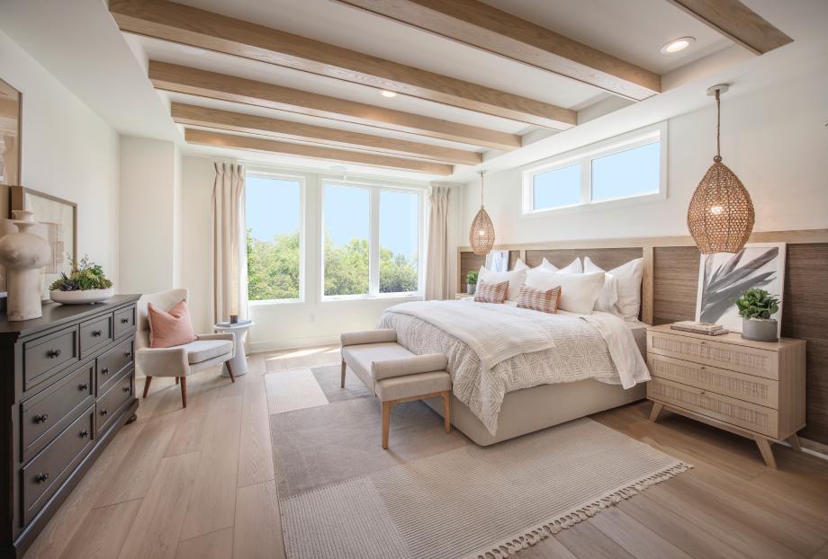 Spacious primary bedroom retreats