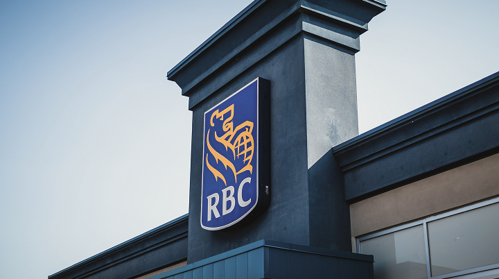 A close-up of the RBC logo on the outside of a building.