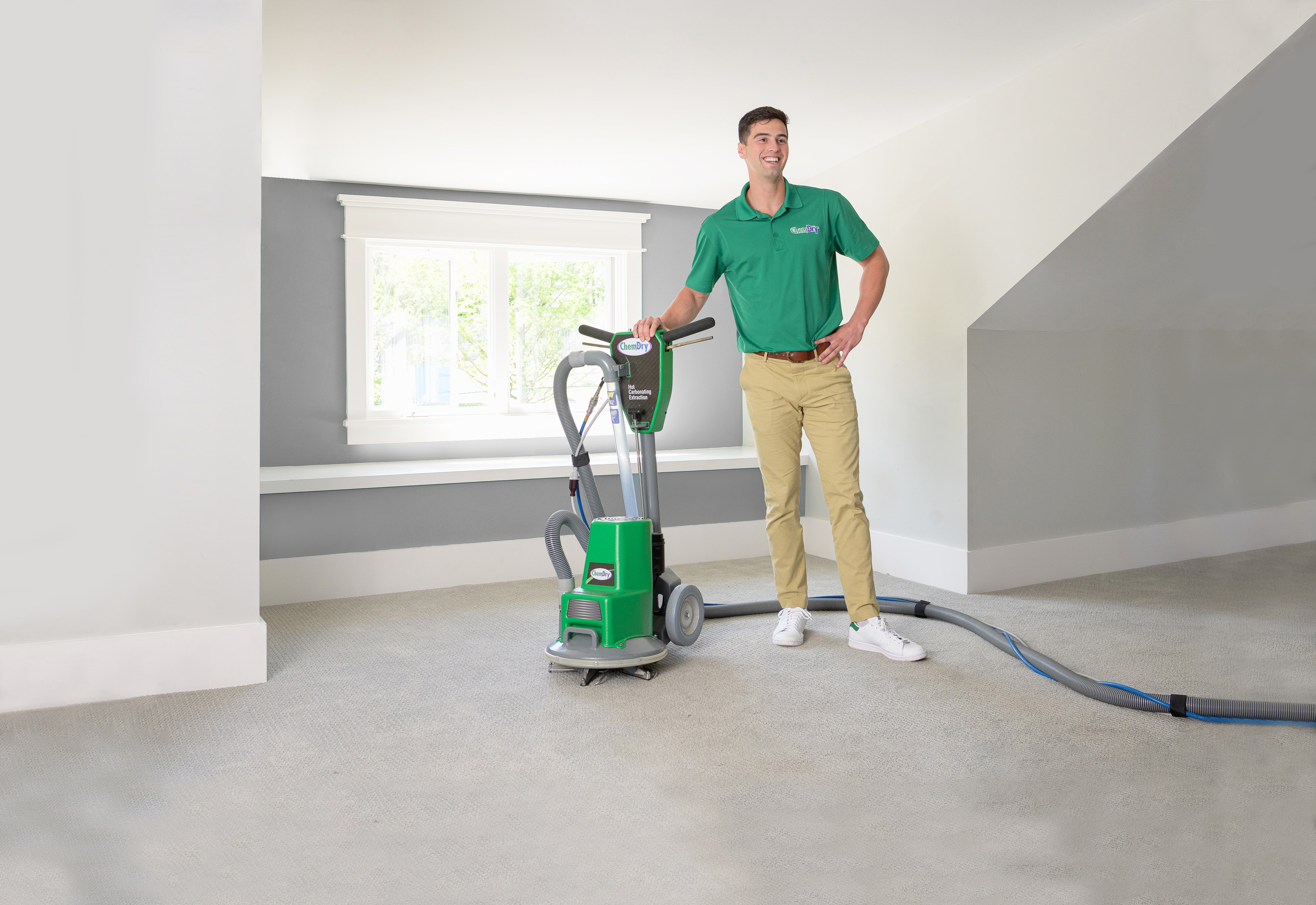 Tech performing carpet cleaning in Andover, MN