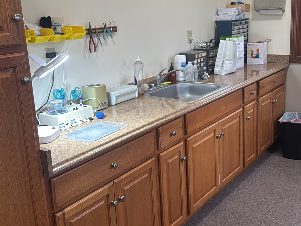 Interior photo of the hearing aid lab in the AudioNova hearing clinic in Fort Wayne, IN