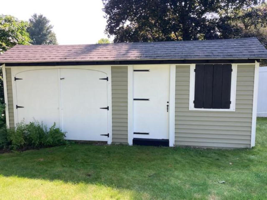 Our handyman traveled to Andover, MA to paint three sheds for this residence.