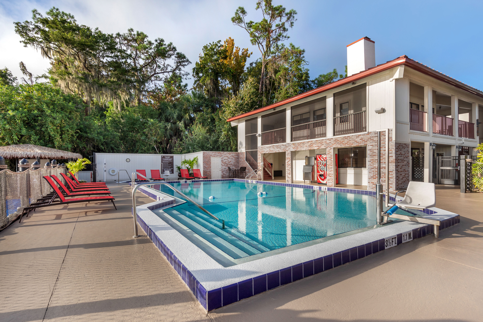 The outdoor pool with seating at Bryan's Spanish Cove.