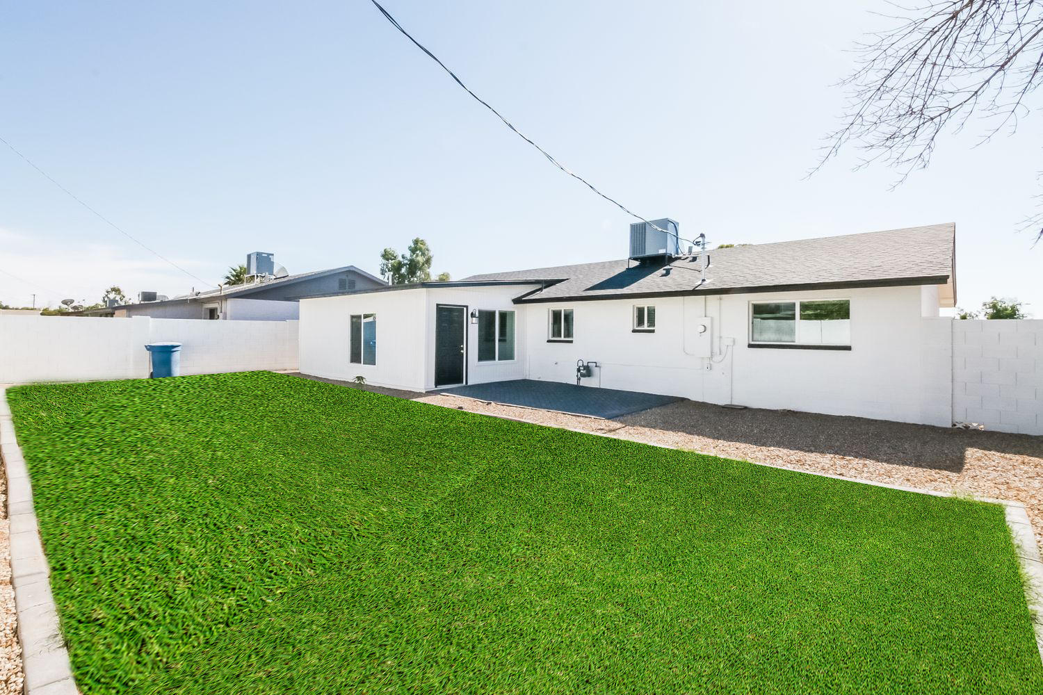 Huge fenced backyard with patio at Invitation Homes Phoenix.