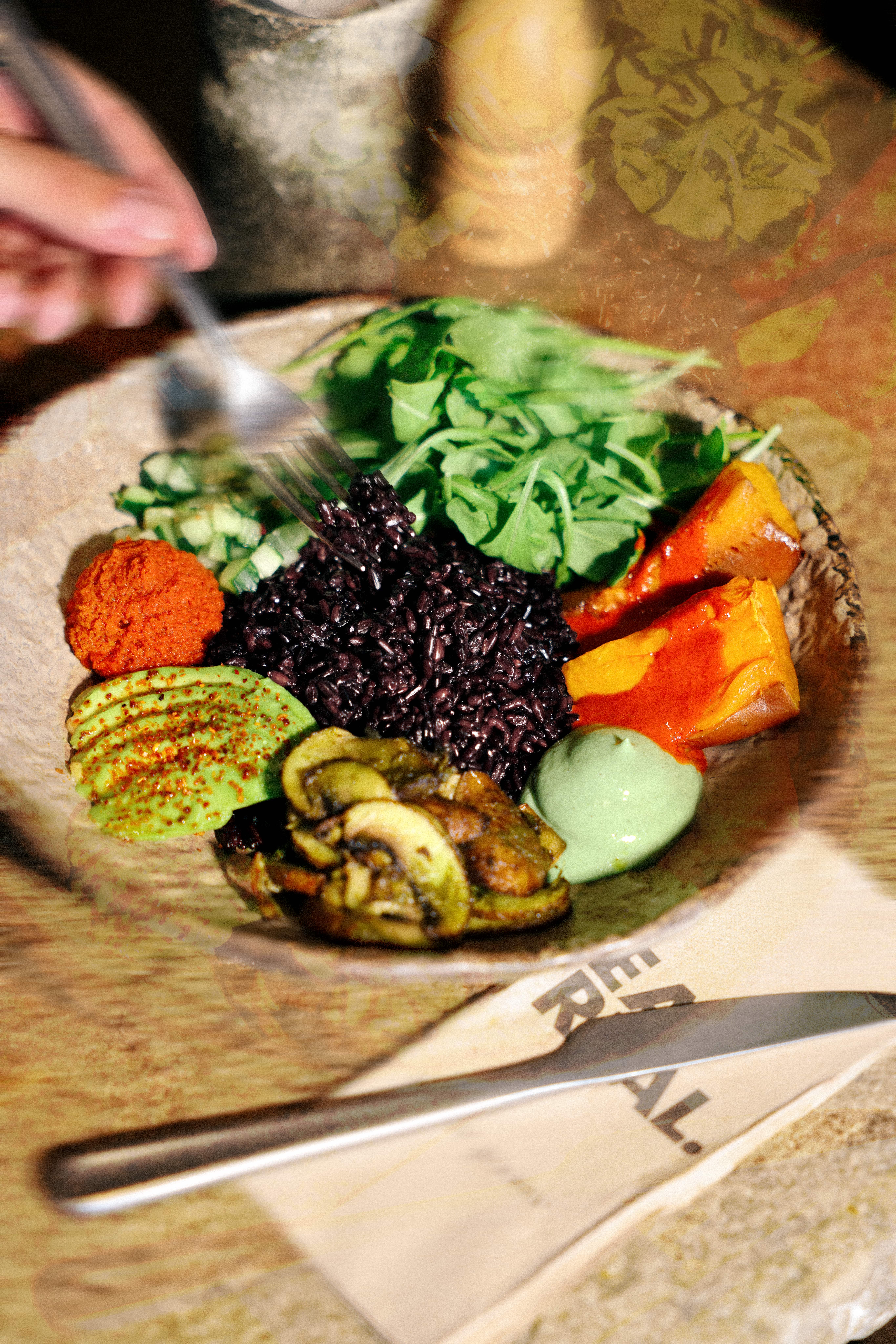 Wild Mediterranean Bowl with black rice, avocado and roasted vegetables.