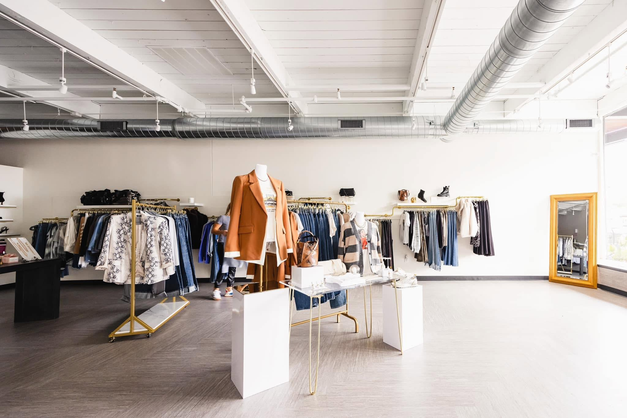 Step inside Covered Boutique and discover a curated collection of stylish women's clothing, accessories, and everyday fashion essentials in a bright, modern shopping space designed for effortless style.