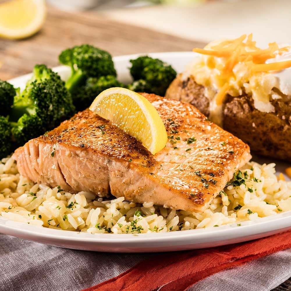 Grilled Salmon: Try our salmon grilled, blackened or bourbon-glazed over rice. Served with two sides Cheddar's Scratch Kitchen Lexington (859)272-0891