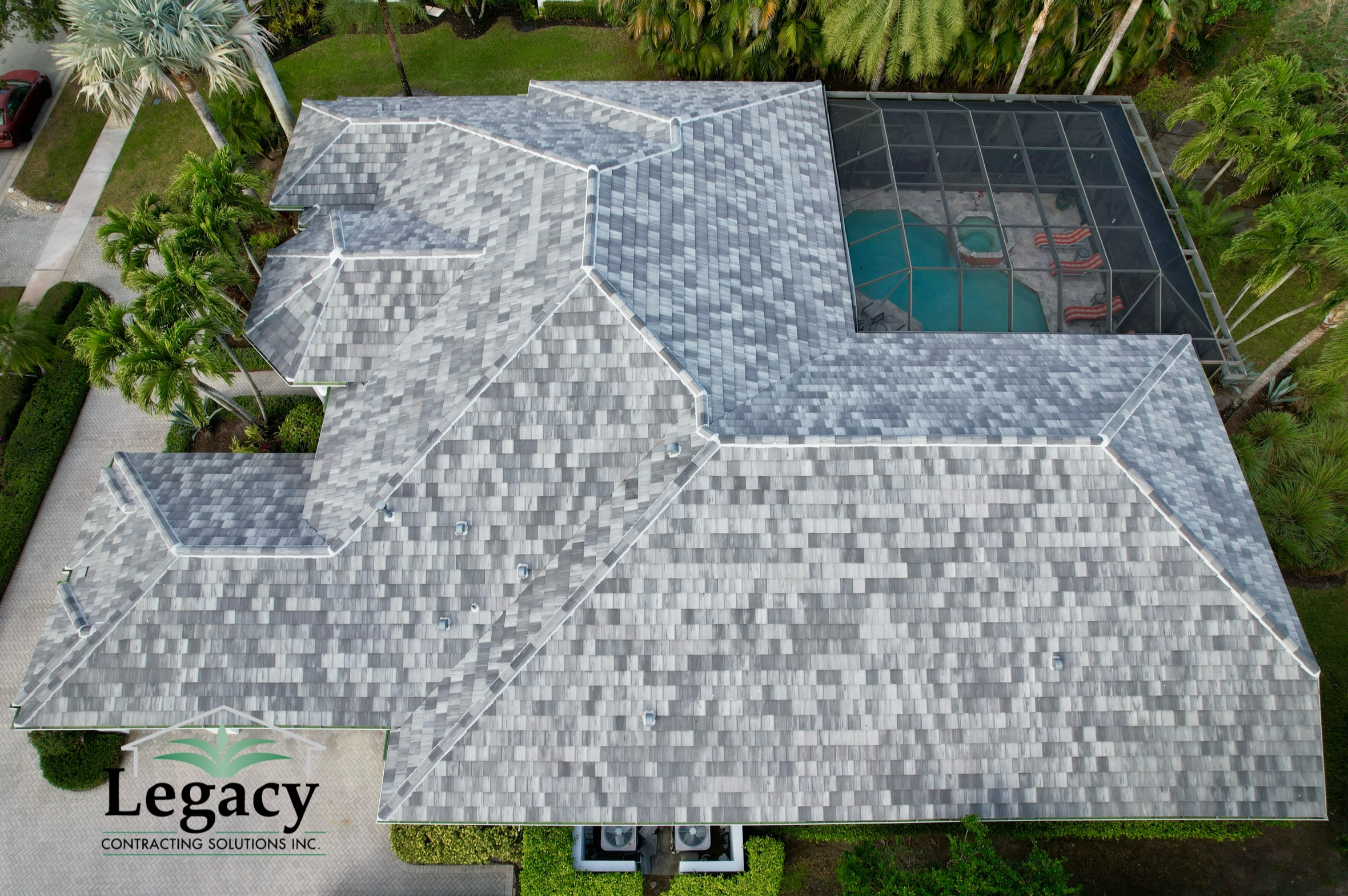 We replaced this roof and installed flat roof tiles from Eagle. This tile color is called Grays Peak Range.