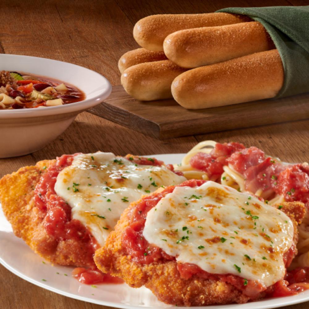 Two lightly fried Parmesan breaded chicken breasts topped with our homemade marinara sauce and melted Italian cheeses served with spaghetti.