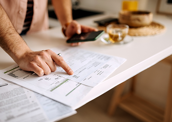 An individual looking over their taxes.
