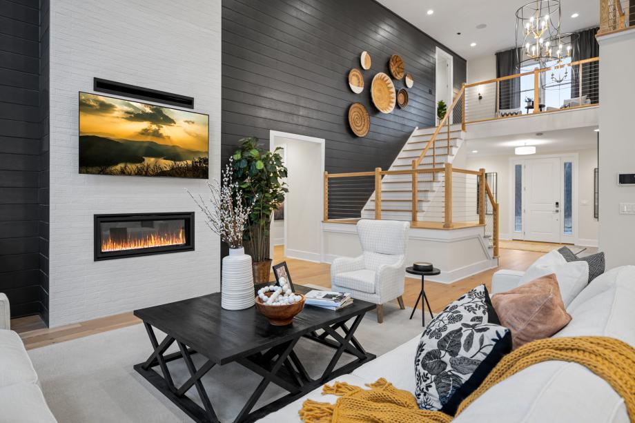 Two-story great room features gas fireplace