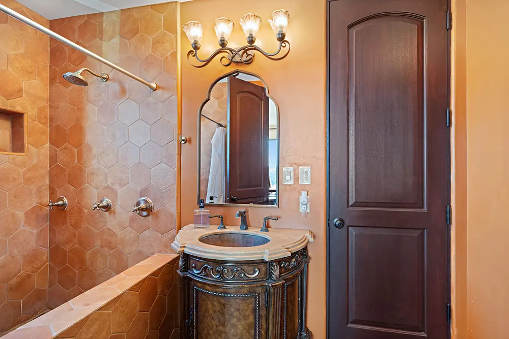 Elite, fully equipped bathroom featuring high-quality finishes to ensure comfort, privacy, and a premium residential experience.