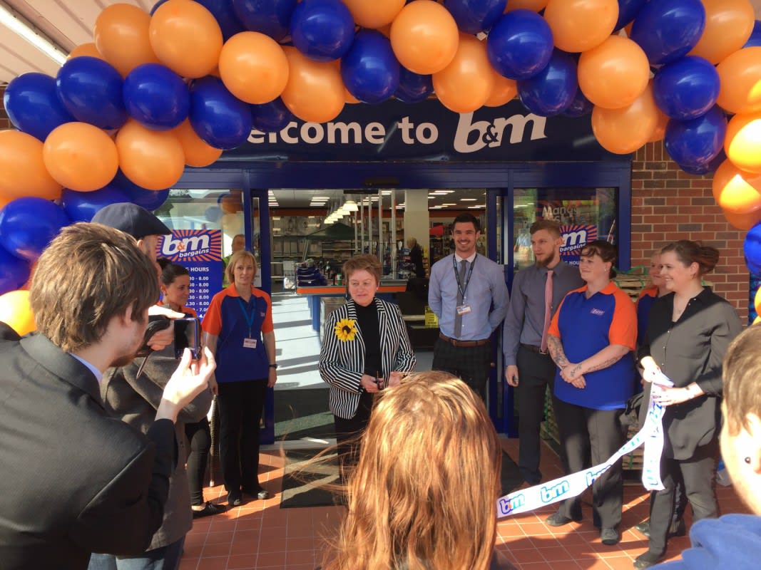 Libby Kendrick of Lindsay Lodge Hospice cut the ribbon at the opening ceremony. B&M Brigg store manager James Smith presented Mrs Kendrick with £250 worth of vouchers, as a thank you for opening the store.