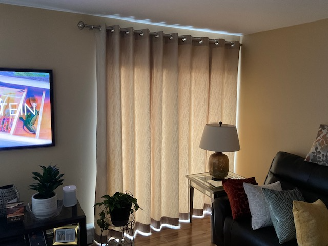 Sliding glass doors let in a lot of light—and let the neighbors see in, too! We came up with a great solution for this Croton on Hudson home! View the gallery to see our Grommet Top Drapery Panels!