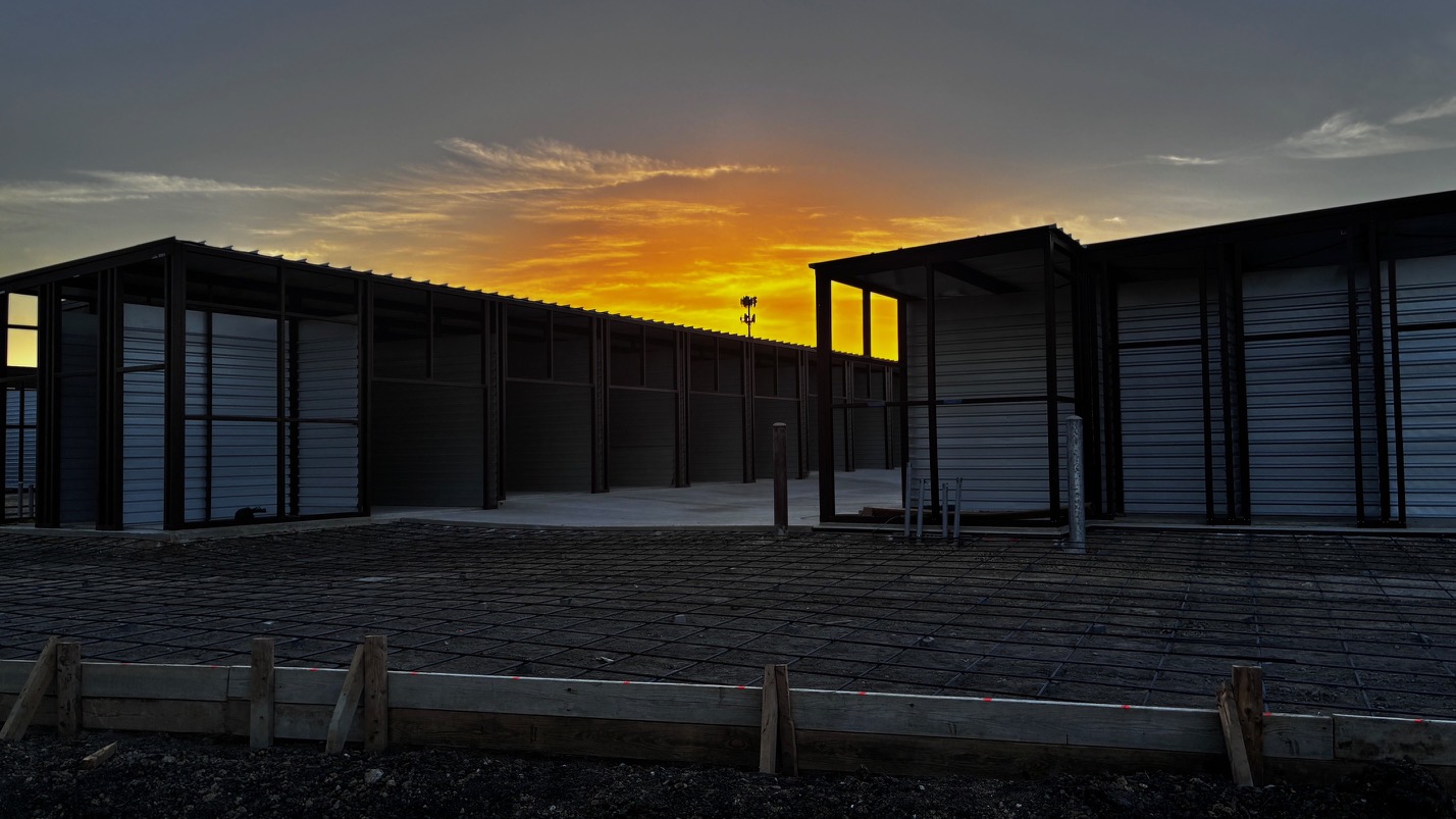 Commercial storage facility development captured during the construction phase, featuring engineered 