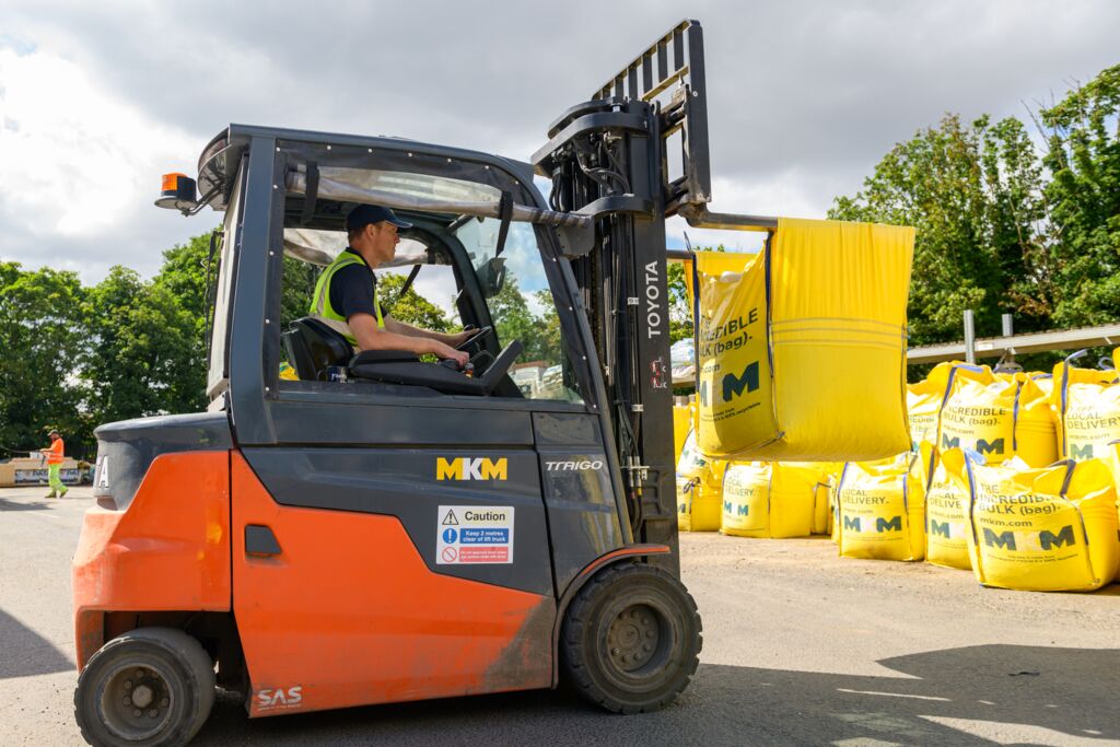 Image of man driving forklift with MKM bulk bag