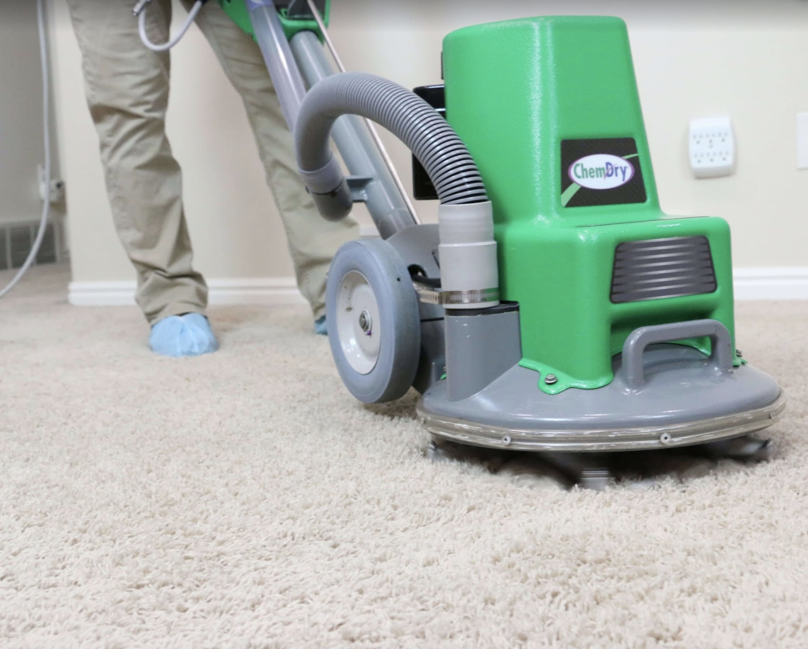 CJ's Chem-Dry tech performing carpet cleaning in Hennepin County, MN home