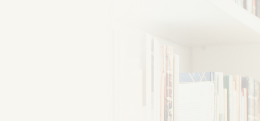 Close-up of a filled bookshelf.