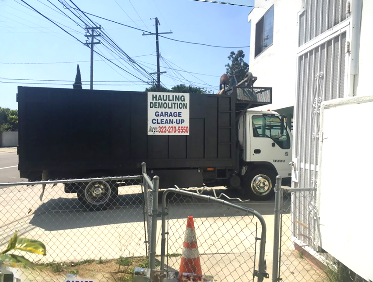 Jorge's Hauling & Demolition Services- garbage truck