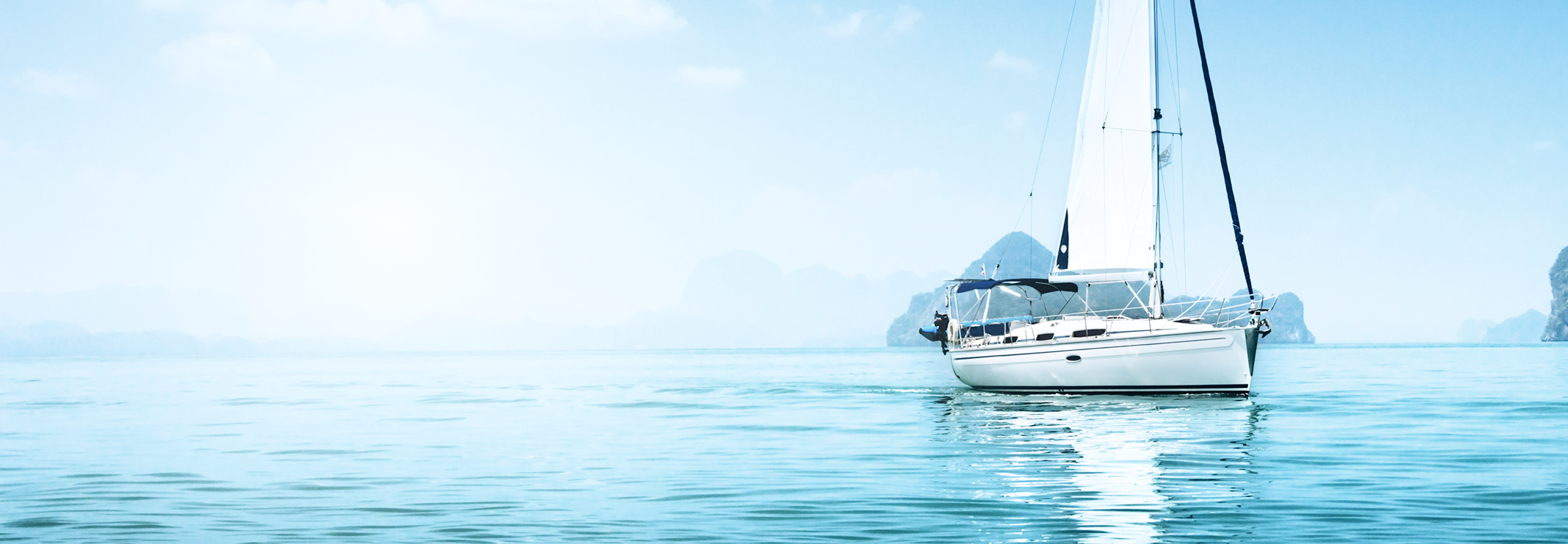 A sailboat on calm waters.