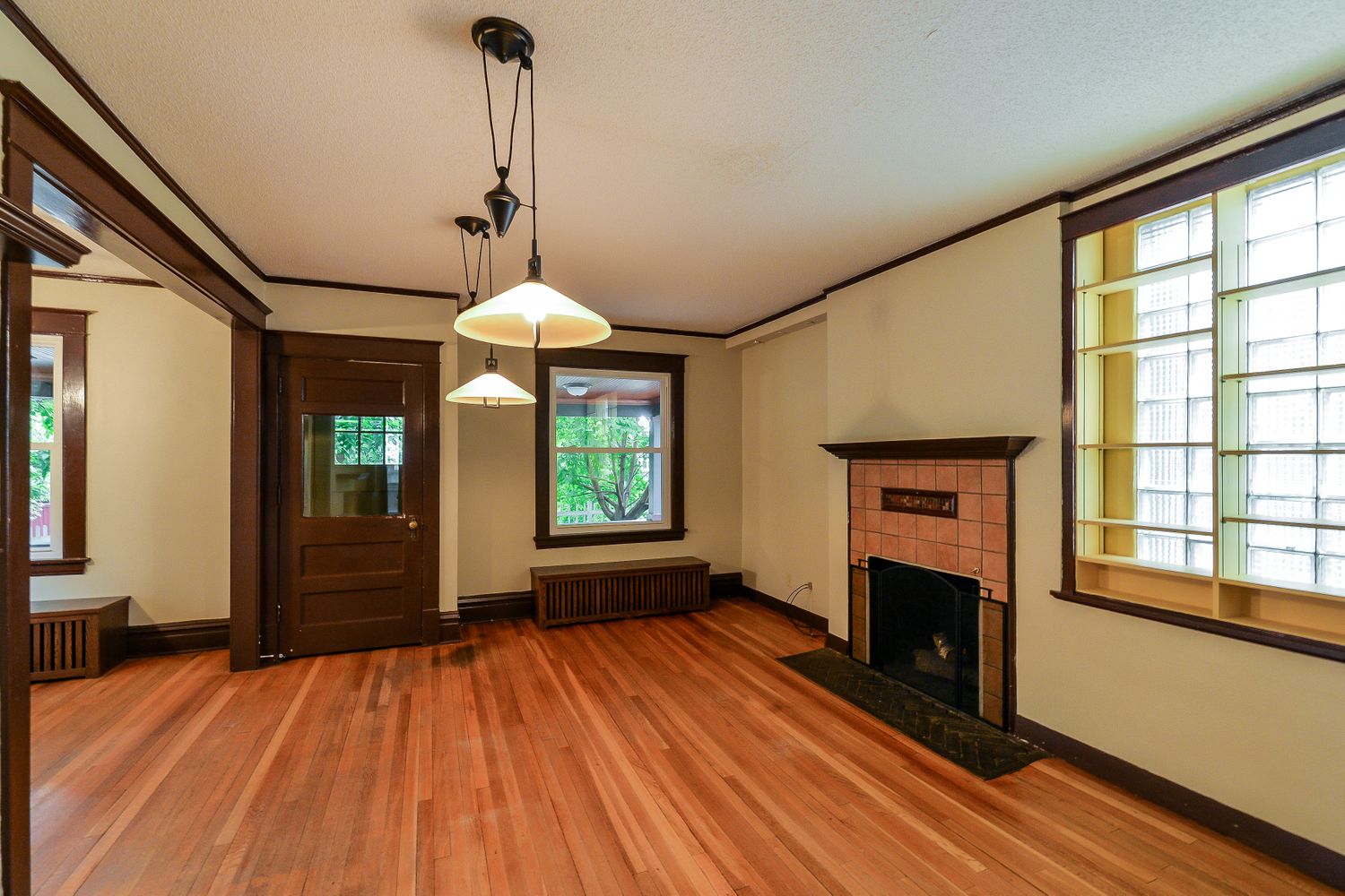 Beautiful family room with wood flooring at Invitation Homes Minneapolis.