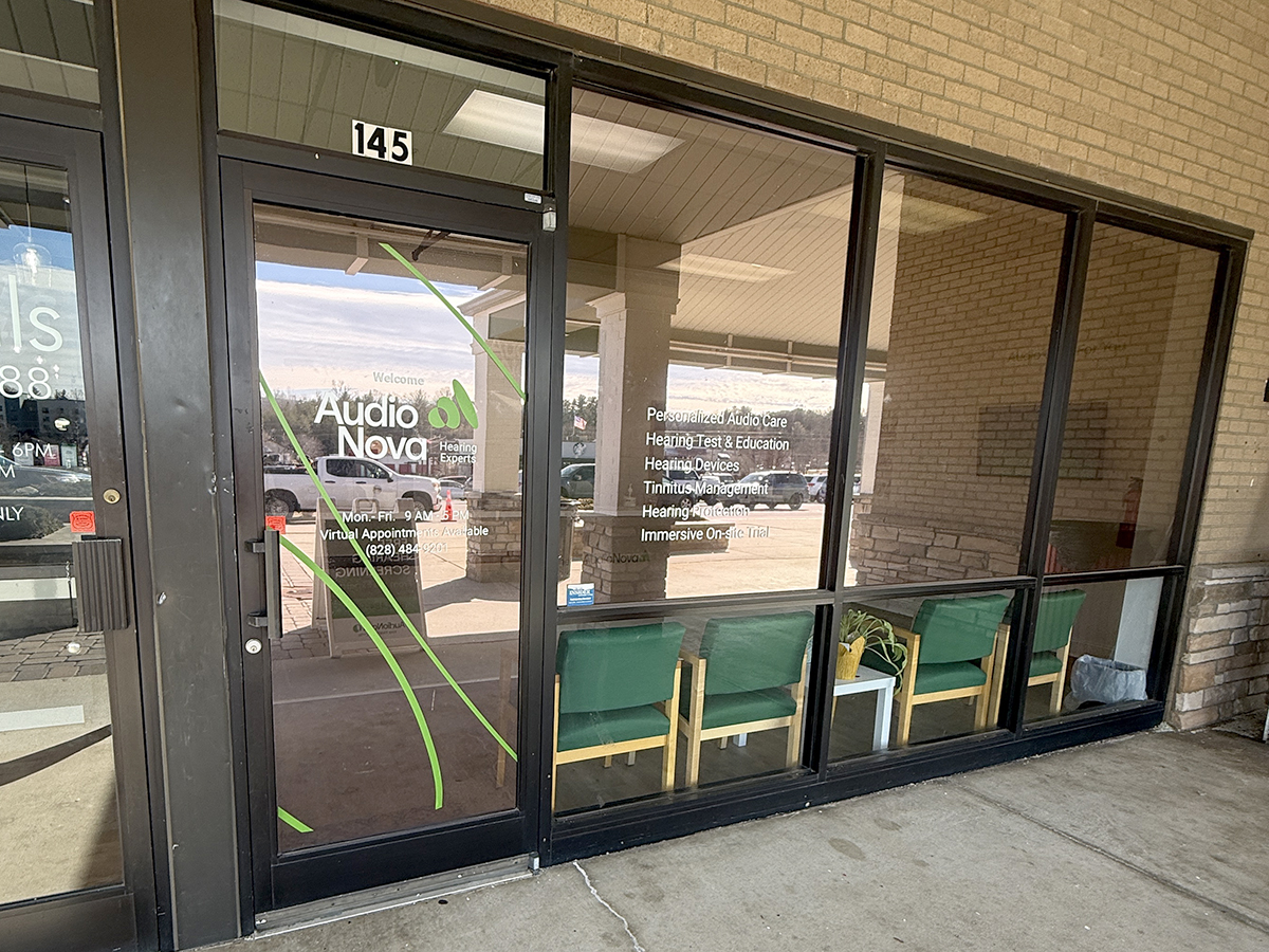 Exterior photo of front door of AudioNova hearing clinic in Weaverville, NC