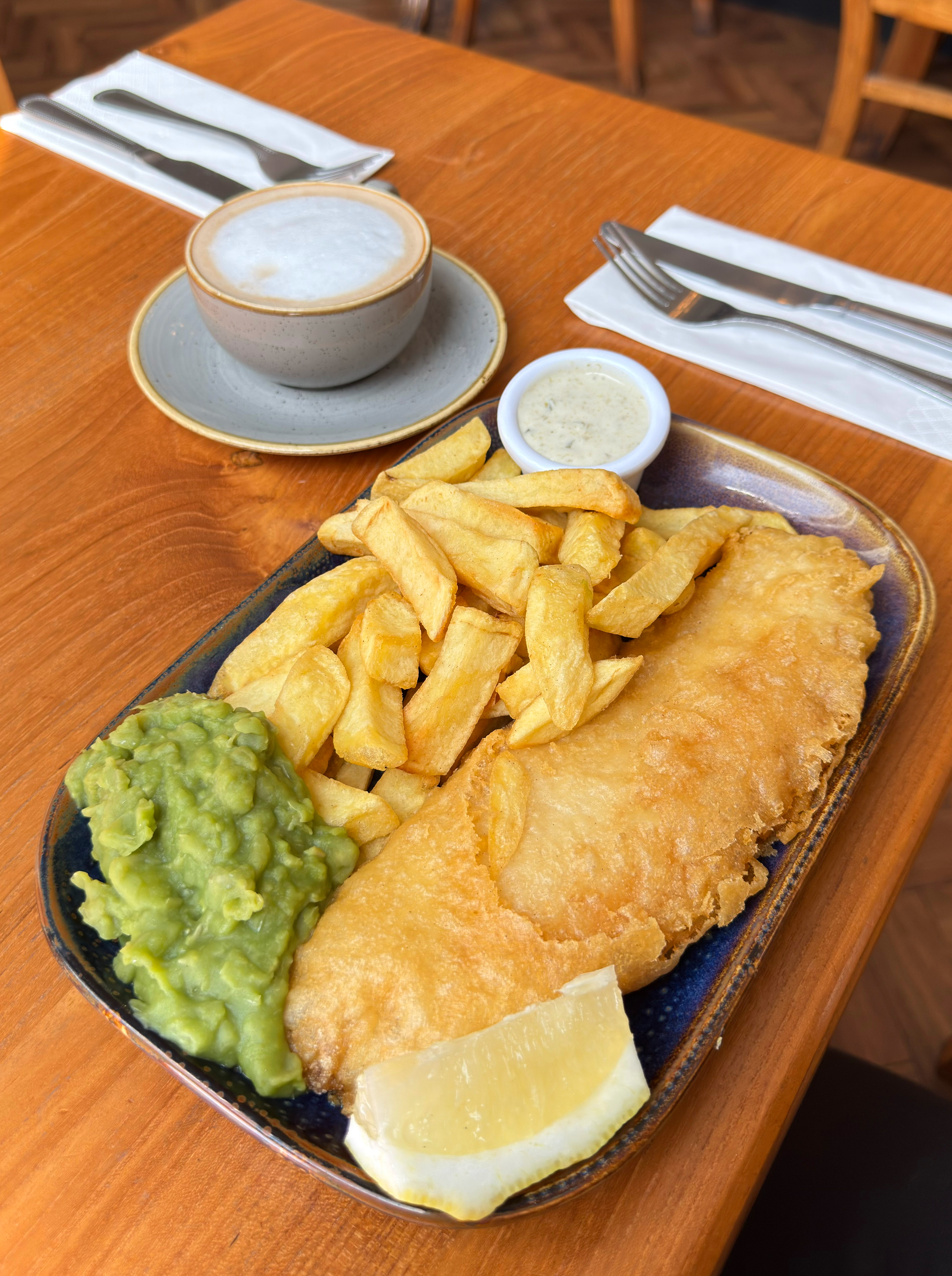Fish, chips, mushy peas and a hot drink from &pound;9.95!