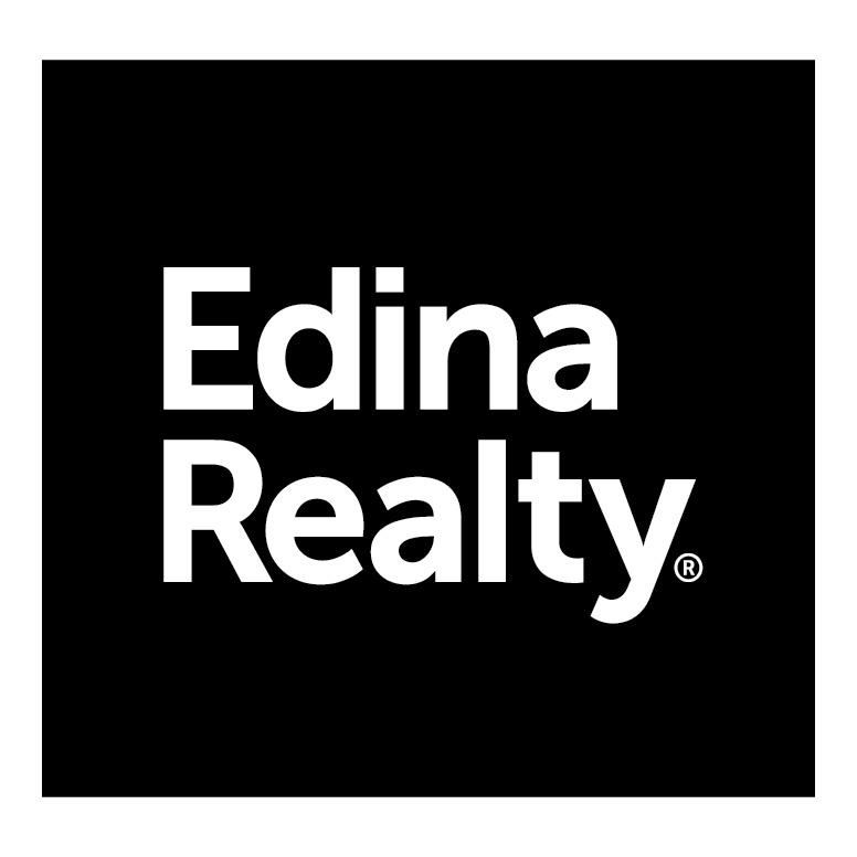 Tracy Hasselman, REALTOR - Edina Realty Logo