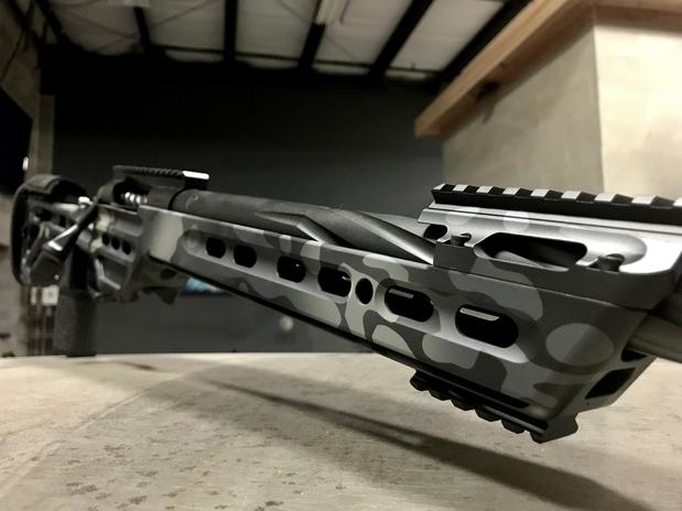Images Armory Valentine, LLC Cerakote Coating, Laser Engraving & Custom Holsters