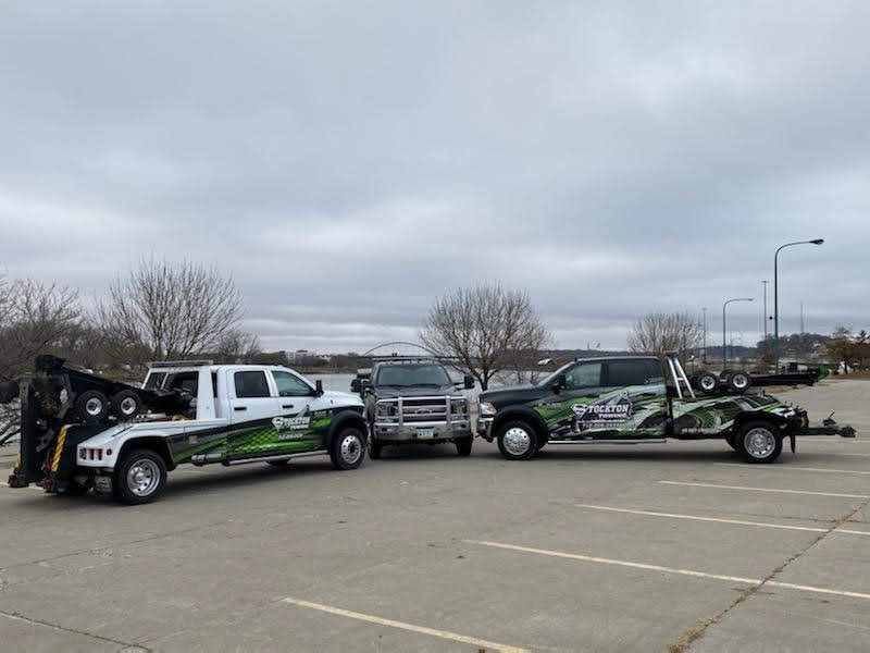 Stockton Towing | (712) 259-2434 | Sioux City, IA | 24 Hour Towing Service | Light Duty Towing | Medium Duty Towing | Heavy Duty Towing | Flatbed Towing | Wrecker Towing | Box Truck Towing | Dually Towing | Motorcycle Towing | Auto Transports | Limousine Towing | Classic Car Towing | Luxury Car Towing | Sports Car Towing | Exotic Car Towing | Long Distance Towing | Tipsy Towing | Junk Car Removal | Winching & Extraction | Accident Recovery | Accident Cleanup | Equipment Transportation | Moving Forklifts | Scissor Lifts Movers | Boom Lifts Movers | Bull Dozers Movers | Excavators Movers | Compressors Movers | Loadshifts | Wide Loads Transportation | Commercial Truck Towing | School Bus Towing | RV Towing | Motorhome Transport | Private Property Impound (Non-Consensual Towing) | Police Impounds | Parking Lot Enforcement | Repossessions | Roadside Assistance | Lockouts | Fuel Delivery | Fluid Delivery | Jump Starts | Tire Service | Tire Changes | Mobile Mechanic | General Auto Repair | Brake Service | Electronic Repairs | Steering & Suspension | Engine Repair | Preventative Maintenance | Transfer Cases | Differential Repair | Tune Ups | Oil Changes | A/C Repair | Tire Repair | New Tire | Fix Tire | Replace Tire | Fix Wheel | Fix Flat | Hot Patches | Used Tires | Wheel Balance