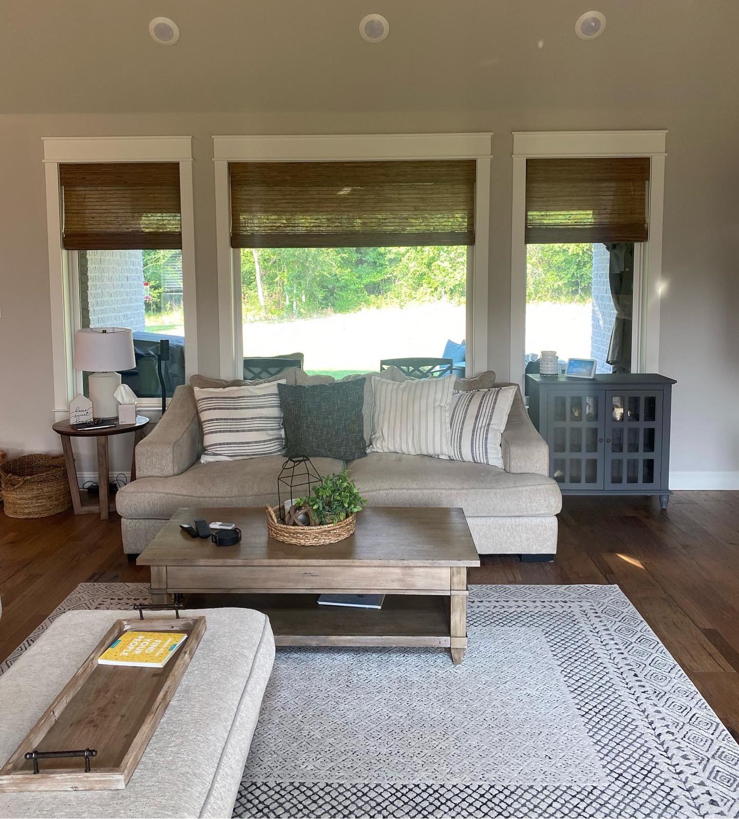 Another successful window treatment install. Our team at Budget Blinds of Rockwall, Terrell, and Greenville are blown away with how gorgeous the woven wood shades look in our client's living room in Wills Point, TX.