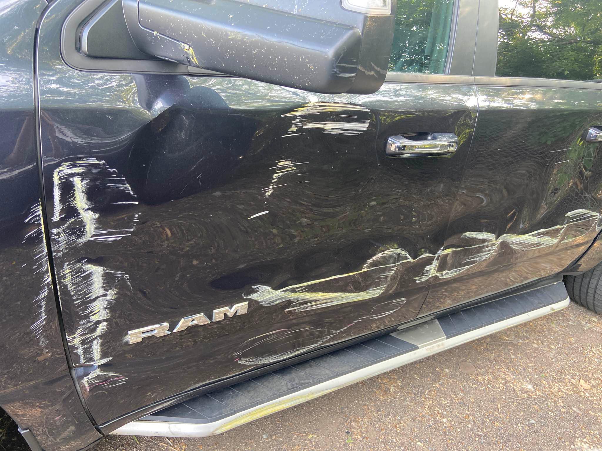 Up Close Damage Before Repairs 2019 Dodge Ram Big Horn Modern Auto Body Brooklyn Park (763)424-8073