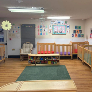 Bright and colorful preschool classroom at Childcare Network with age-appropriate learning materials
