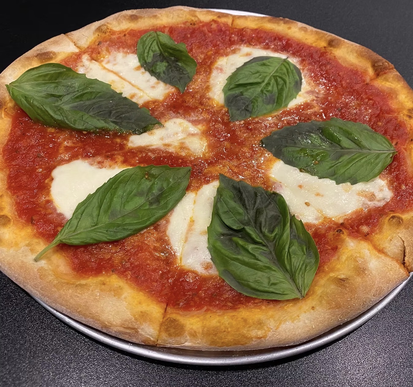 Tomato sauce, fior di latte fresh mozzarella, fresh basil and Pecorino Romano
