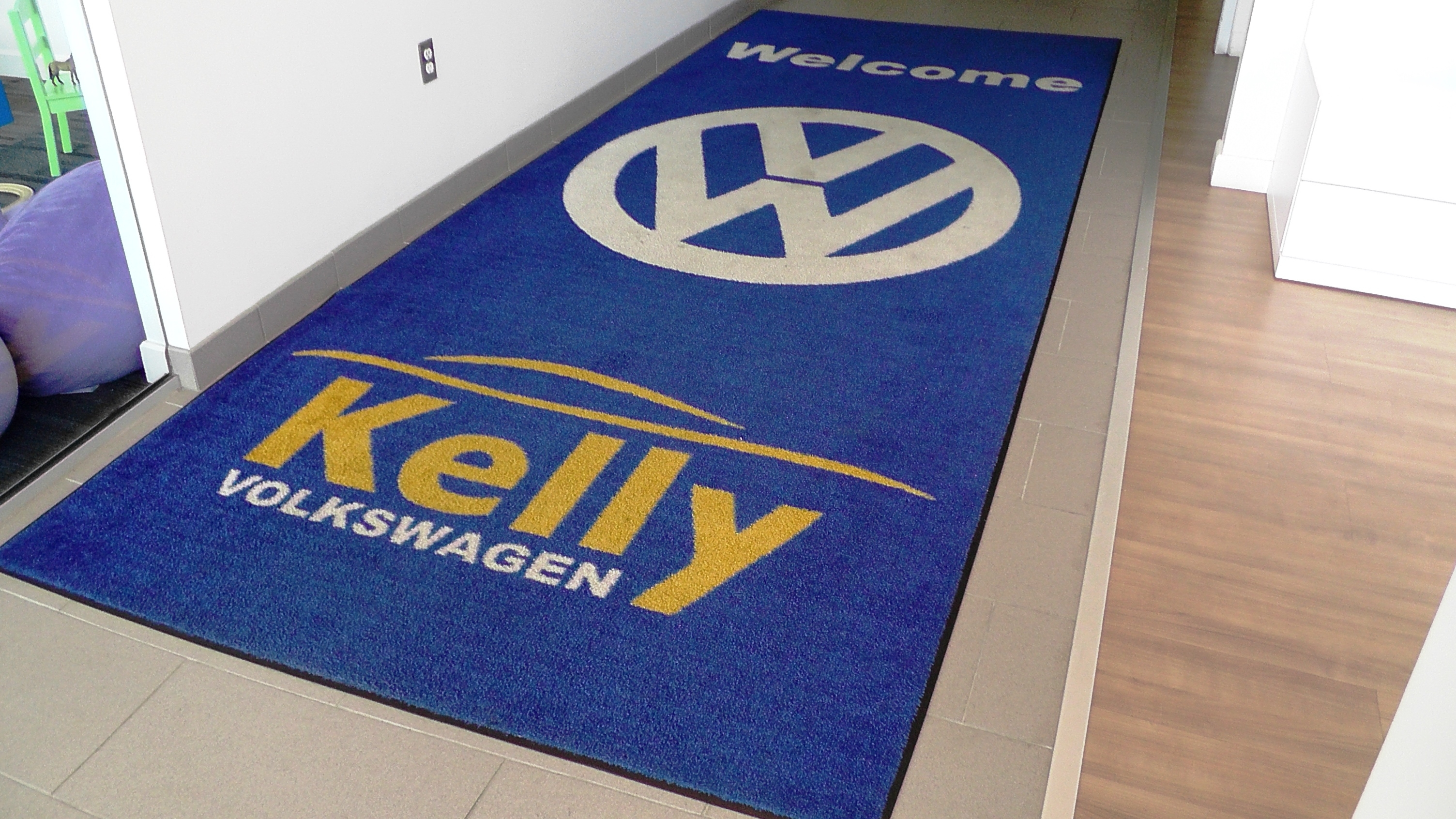 Nothing says welcome to Kelly Volkswagen like a Welcome mat right? It's a small touch, but one that we think tells you how much we appreciate you visiting our dealership. You'll also find a large welcome sign just above this area.
