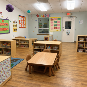 Bright and colorful preschool classroom at Childcare Network with age-appropriate learning materials