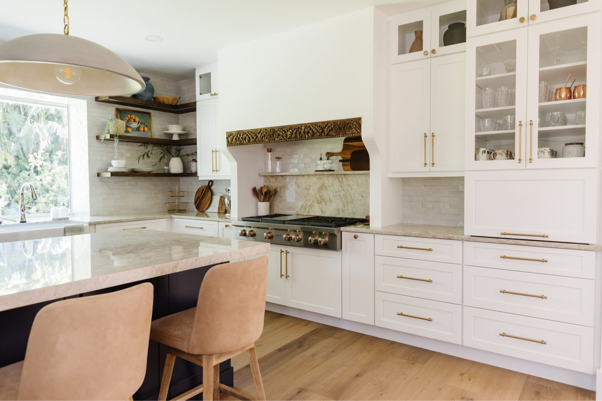 Custom kitchen remodel with white cabinetry and open shelving by Coastal Pro Construction in Jensen Beach, FL