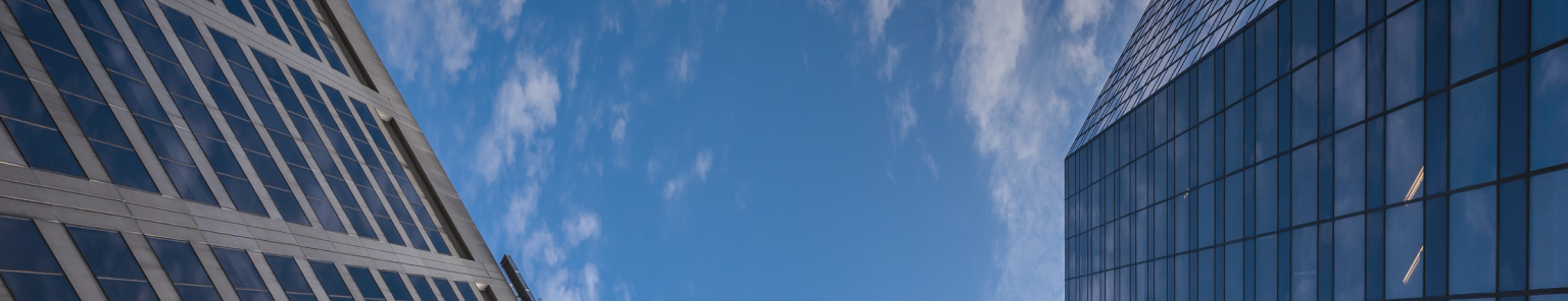 Buildings in Montreal and the sky as seen from below.