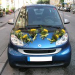 Hochzeit smart mit sonnenblumen  - Blütenkorb München