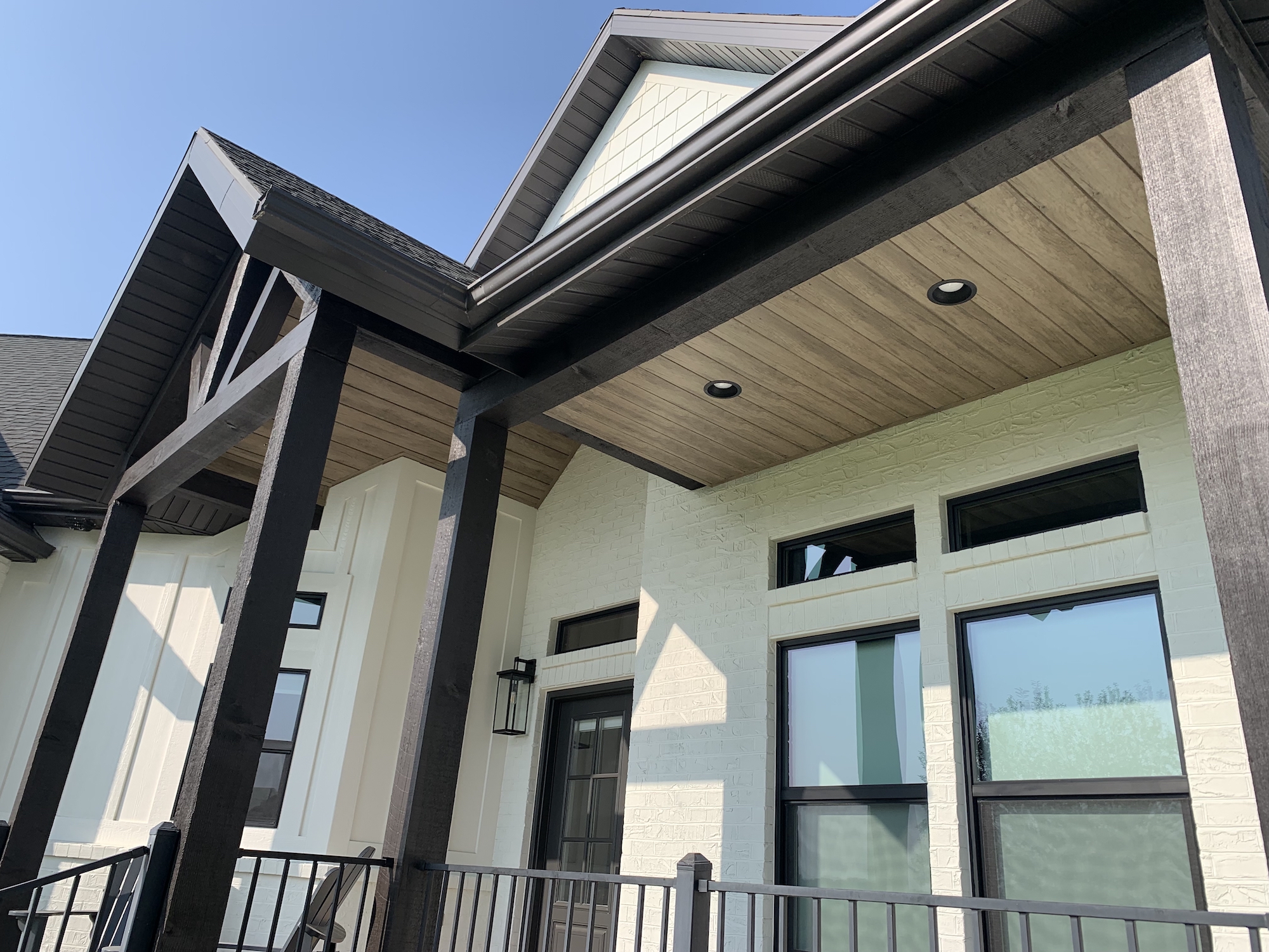 Large home with chamclad siding installed